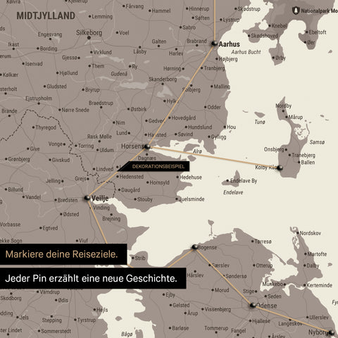 Detailed map of Denmark as a Warmgray (brown-gray) pinboard canvas, featuring travel destinations in Central Jutland marked with pins and a travel route shown with string