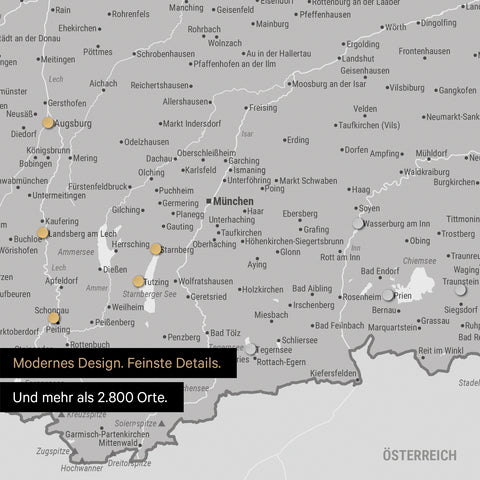 Ausschnitt einer magnetischen Deutschland-Karte in Multicolor Gray zeigt Karte von Bayern, auf der Magnete Reiseziele markieren