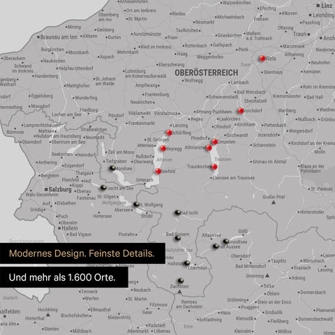 Ausschnitte einer Österreichkarte mit dem Salzkammergut und der Steiermark als Pinn-Leinwand in Hellgrau mit 1.600 Orten