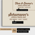 Pinnwand Leinwand einer Afrika-Karte in Desert Sand (Beige) mit Personalisierung als Logo mit Familiennamen und Legende