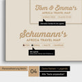 Pinnwand Leinwand einer Afrika-Karte in Warmgray (Braun-Grau) mit Personalisierung als Logo mit Familiennamen und Legende