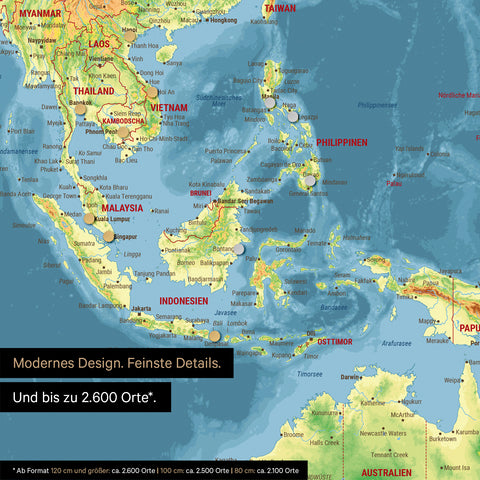Dettaglio di una mappa topografica magnetica del mondo in Multicolor Topo che mostra la mappa dell'Asia, con magneti che indicano le destinazioni di viaggio