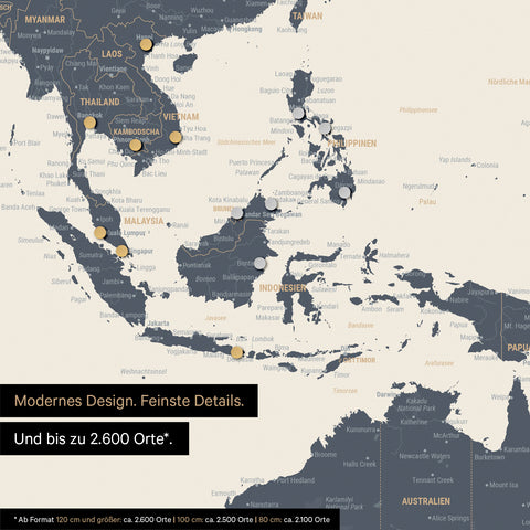 Dettaglio di una mappa magnetica del mondo in Multicolor Navy Light che mostra la mappa dell'Asia, con magneti che indicano le destinazioni di viaggio